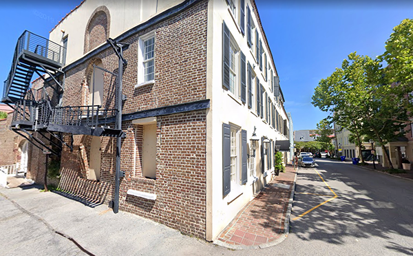 One of the contractors who worked on the original restoration of 35 Prioleau St. in the mid-1990s said this brick wall on Cordes Street is part of the original building, built in 1814 as a cotton and tobacco warehouse with space for offices. (Photo/Google Maps)