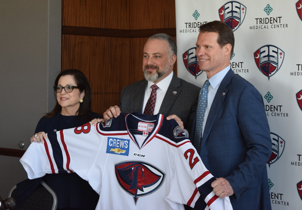 Anita Zucker (from left) and Jonathan Zucker have sold the majority interest in the S.C. Stingrays hockey team to Todd Halloran. Terms of the deal were not disclosed. (Photo Patrick Hoff)
