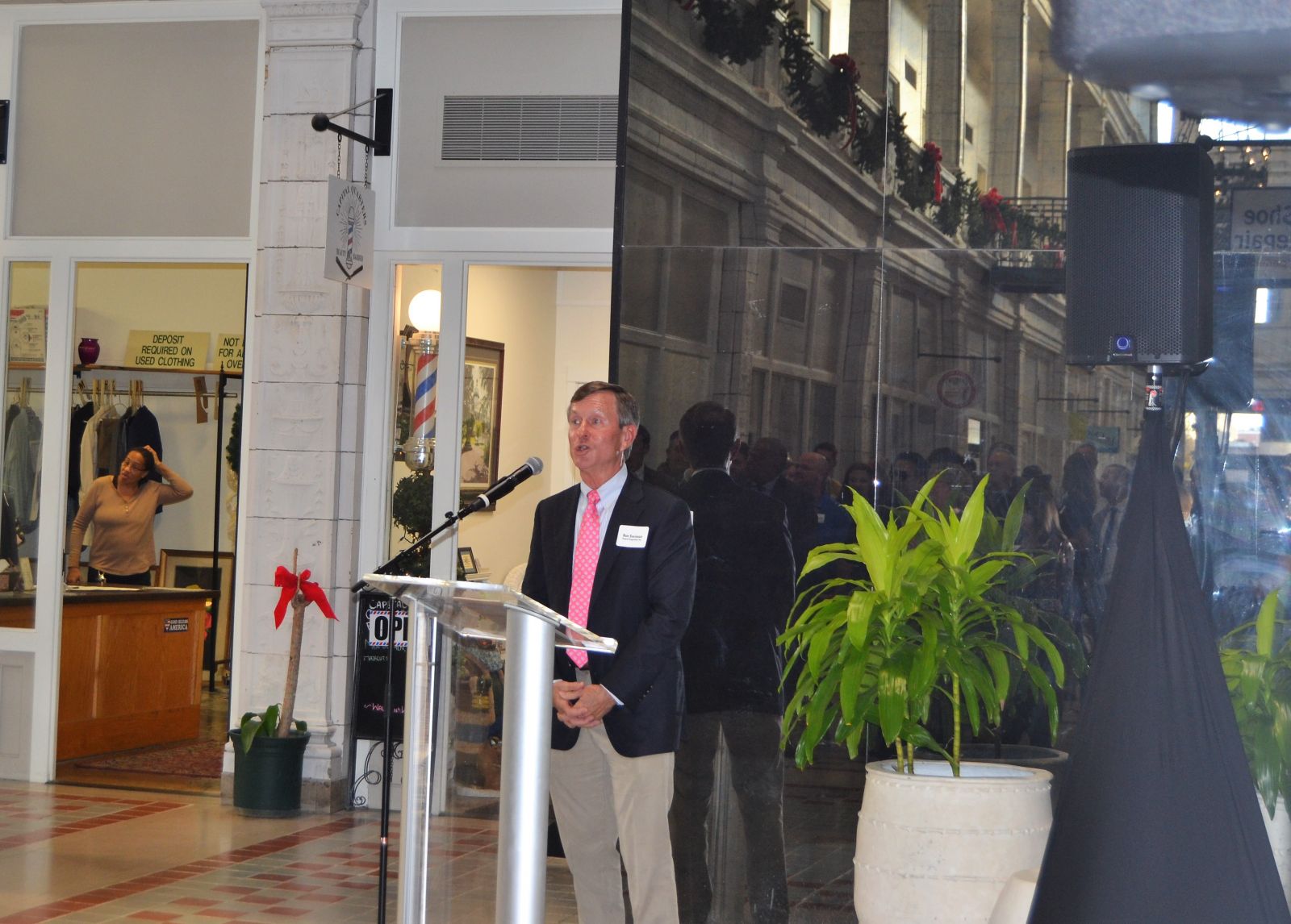 Developer and co-owner of the Arcade Mall Ron Swinson addresses a crowd at the building's re-grand opening celebration on Monday. (Photo/Melinda Waldrop)