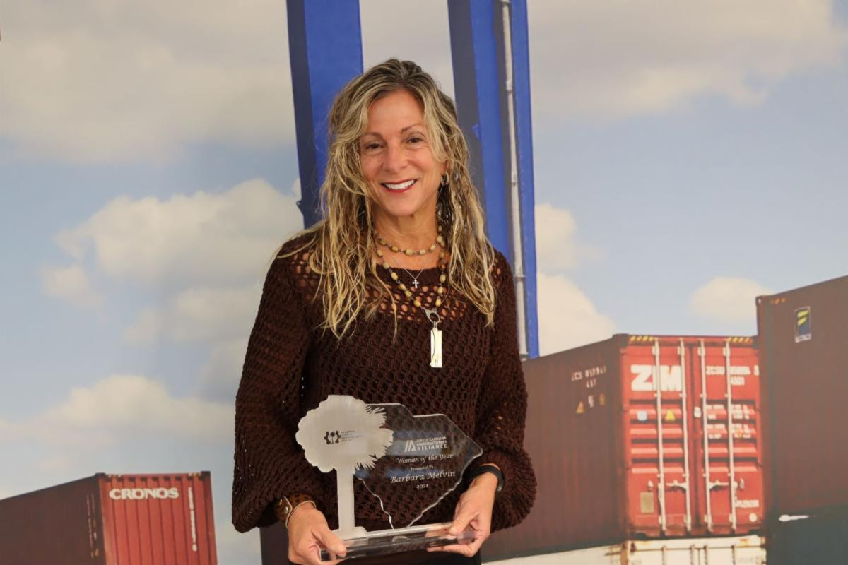 S.C. Ports Authority COO Barbara Melvin holds the award from the S.C. Manufacturers Alliance. (Photo/Provided)