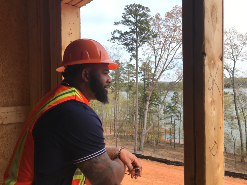 Tajh Boyd often takes interested buyers on tours of the construction site. (Photo/Teresa Cutlip)