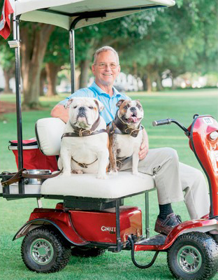 Coach Mike Groshon rides with G2 and Boo X. Groshon, a 1976 Citadel alumnus who had cared for the military college??s mascots since 2003, died in 2016. G3, the newest mascot for the military college, is named after the coach. (Photo/The Citadel)