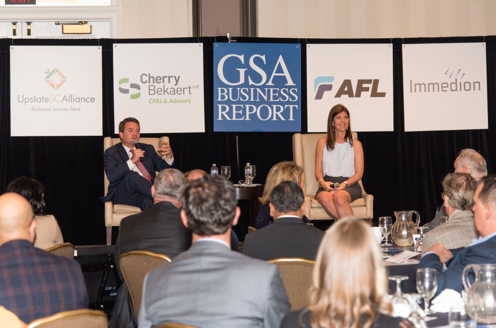 John Lummus, president and CEO of Upstate SC Alliance, and S.C. Lt. Gov. Pamela Evette discuss the economy at a GSA Business Power Event. (Photo/Kathy Allen)