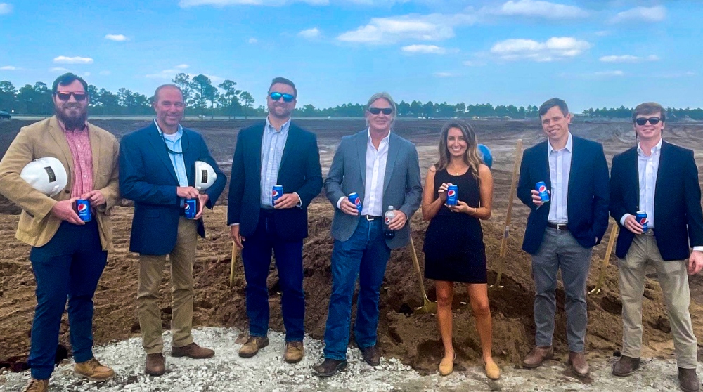 Choate Construction Co. and Edgewater Ventures celebrate the launch of construction of a new distribution facility for Pepsi products. (Photo/Provided)