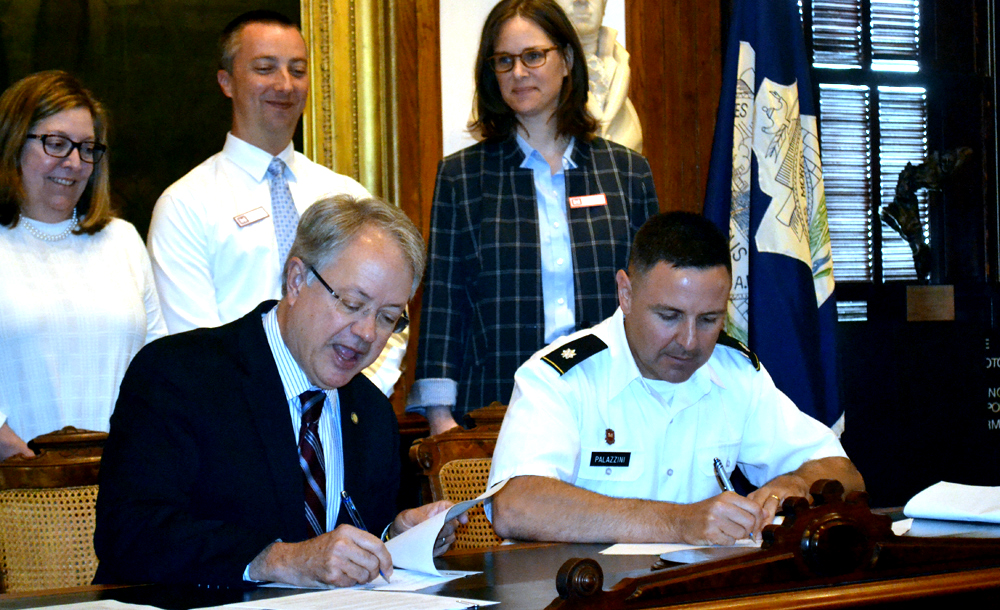 Charleston Mayor John Tecklenburg and Lt. Col. Jeffrey Palazzini, district commander of the Army Corps?? Charleston District, signed an agreement today to begin the Charleston peninsula flooding study. They talked about flooding challenges facing the city during a news conference in Charleston City Hall. (Photo/Liz Segrist)