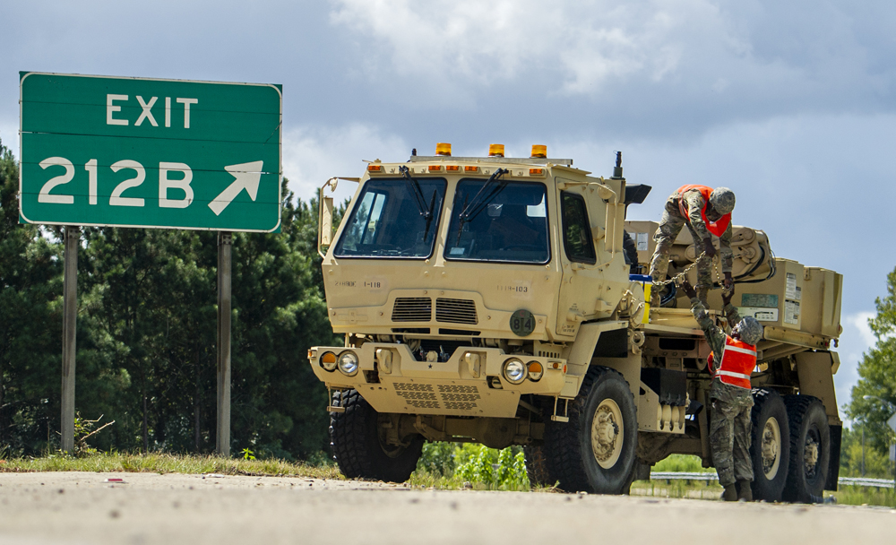 S.C. National Guard soldiers from the 118th Forward Support Company set up equipment to assist disabled vehicles during the lane reversal of Interstate 26 in North Charleston. Approximately 2,000 soldiers and airmen have been mobilized to respond to Hurricane Florence. (Photo/Sgt. Brian Calhoun, 108th Public Affairs Detachment, National Guard)
