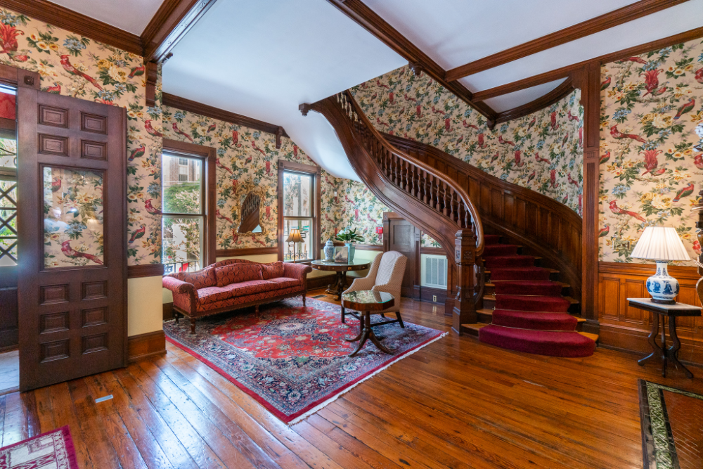 A staircase leads to a second-floor landing at The Governor‰Ûªs House Inn, which is up for sale as a working bed and breakfast or as a property that could be converted back to a residential estate. (Photo/Provided)