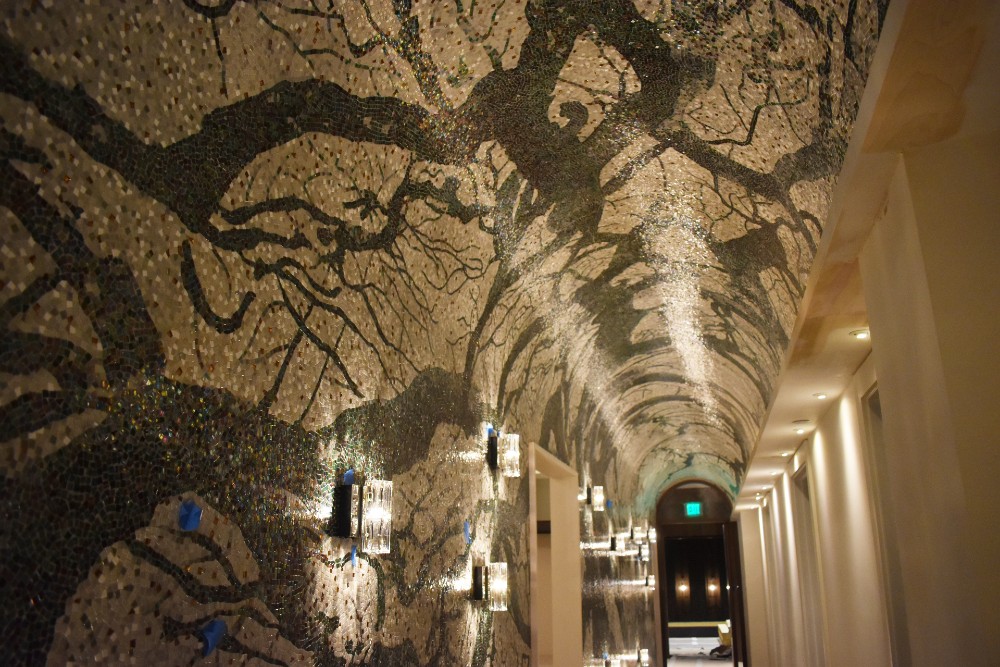 A tree mosaic lines the lodge‰Ûªs private spa corridor on the ground floor. (Photo/Molly Hulsey)