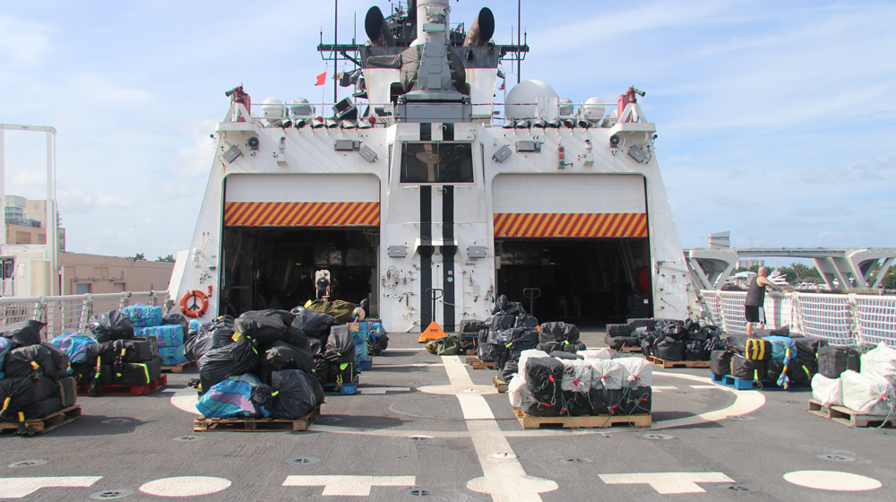 An estimated 12,500 pounds ?? more than 6 tons ?? of cocaine and 50 pounds of marijuana lie on pallets onboard the Coast Guard Cutter Hamilton on Wednesday in Port Everglades, Fla. The drugs were seized by the Coast Guard cutters Hamilton, Alert and Venturous off the coasts of Mexico, Central and South America. (Photo/Coast Guard Ensign Kiana Kekoa)