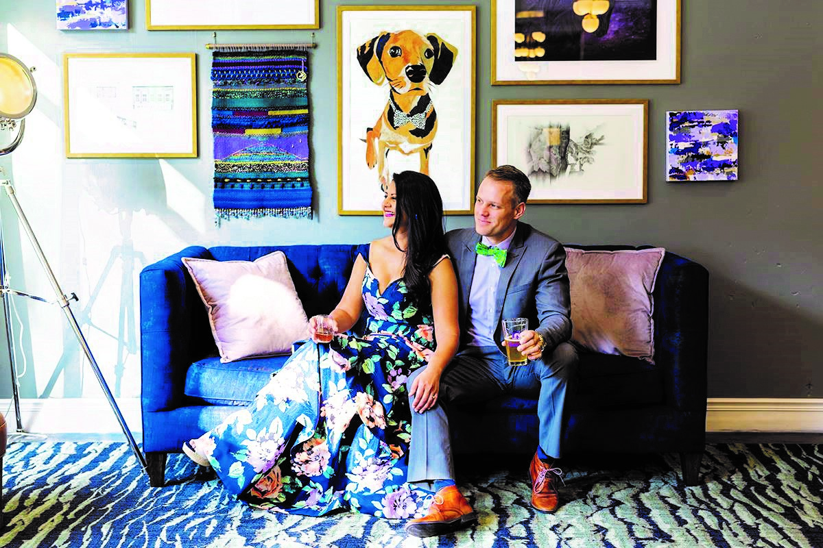 Hotel Trundle co-owners Rita Patel and Marcus Munse pose after learning their downtown boutique hotel was named to Southern Living magazine's Hotel Collection last October. (Photo/Provided)