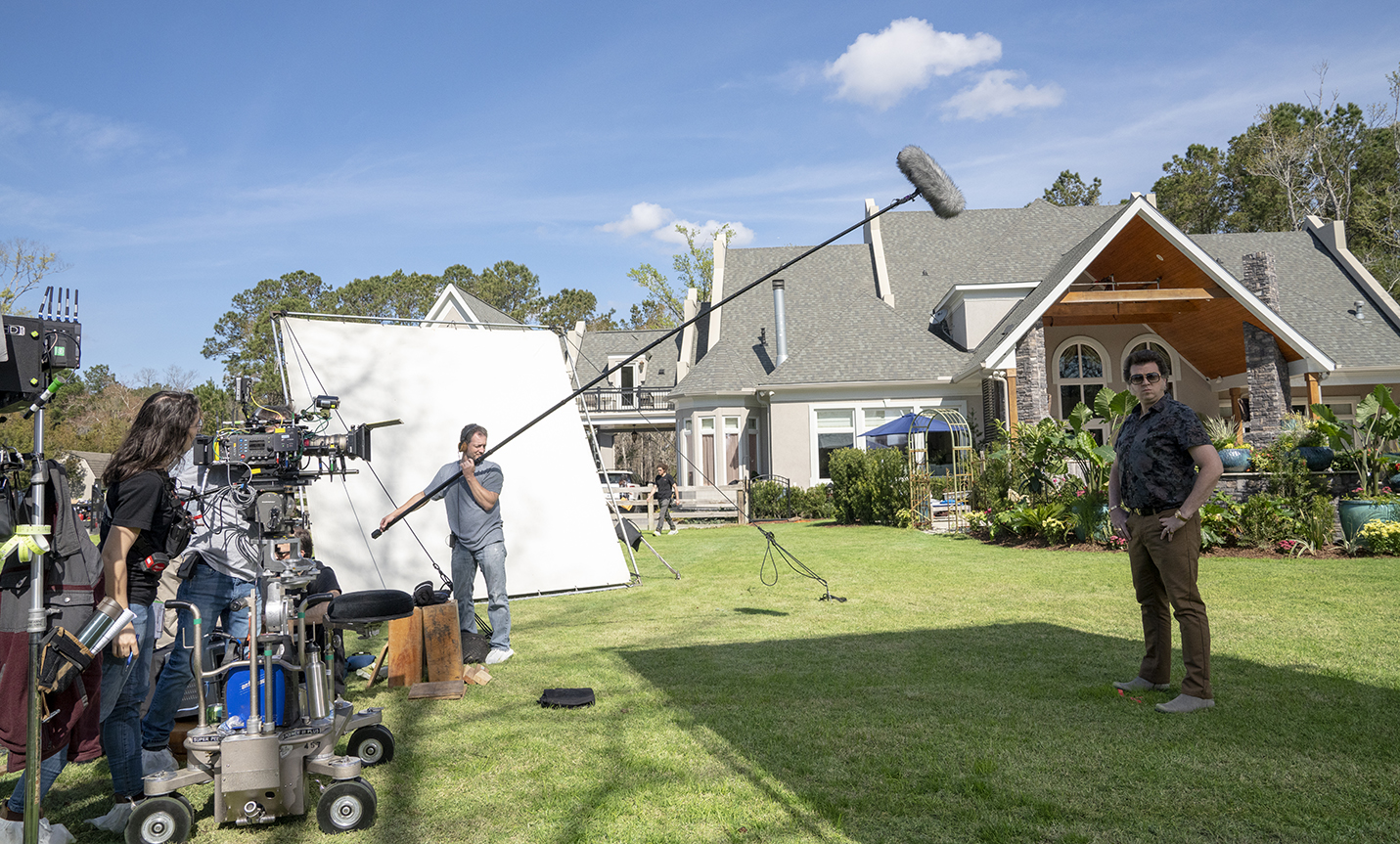 Film and television writer, actor and producer Danny McBride (right) portrays Jesse Gemstone during taping of the HBO hit series The Righteous Gemstones as crewmembers (left) set up for a scene in the Charleston area. (Photo/Fred Norris, HBO)