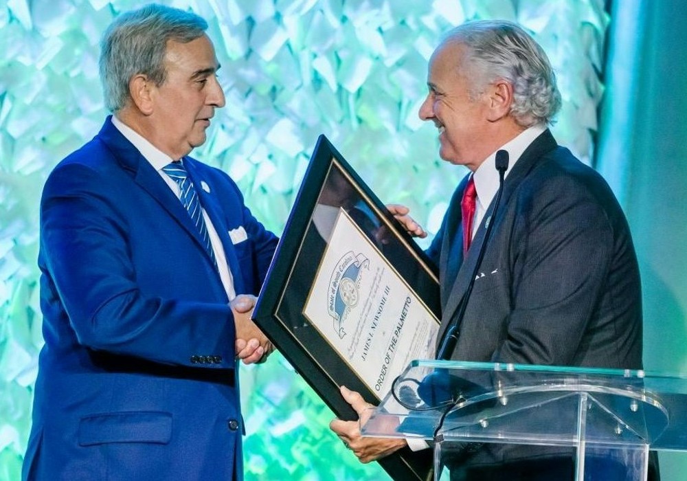 Jim Newsome, last year inducted into the International Maritime Hall of Fame, receives the Order of the Palmetto from Gov. Henry McMaster. (Photo/Provided)
