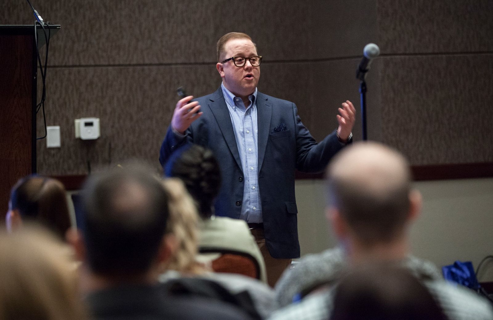 Chase Glenn, MUSC's first-ever director of LGBTQ Health Services and Enterprise Resources, speaks at the hospital's Inclusion to Innovation Summit in 2019. (Photo/Provided)