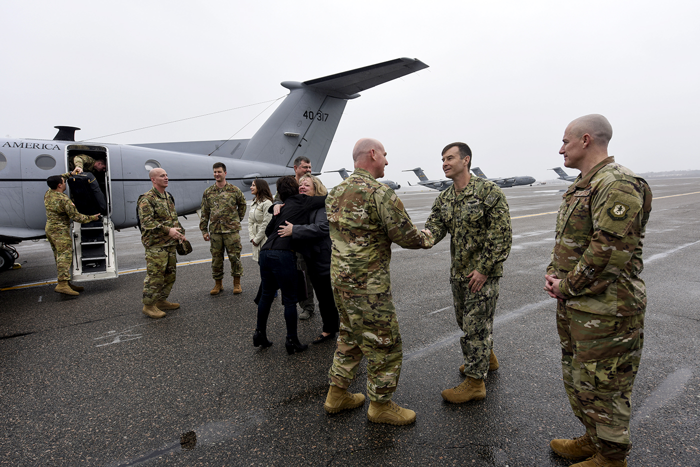 Maj. Gen. Sam Barrett greets Joint Base Charleston leadership. The 18th Air Force, headquartered at Scott Air Force Base, Ill., oversees the base??s 437th Airlift Wing. (Photo/Airman 1st Class Allison Payne for the Air Force)