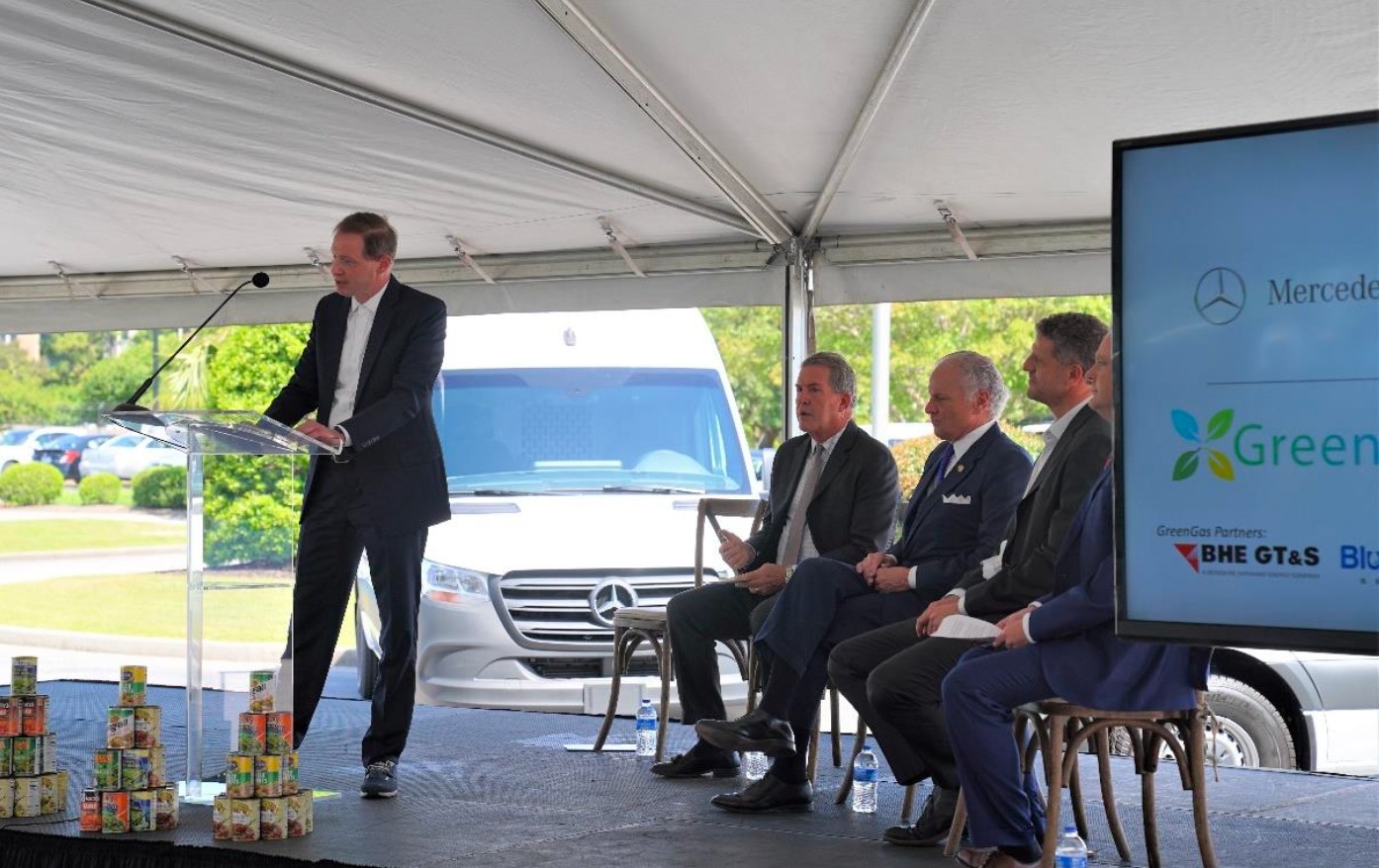 Axel Bense of Mercedes-Benz Vans (from left to right), Commissioner Hugh Weathers from the South Carolina Department of Agriculture, South Carolina Gov. Henry McMaster, Marc Fetten of GreenGasUSA and McCall Swink of McCall Farms gather for the press conference. (Photo/Provided)