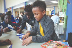 Fifth-grader Tae-Sean Miller said he wants to be an engineer when he‰Ûªs older and that his class‰Ûªs participation in DreamLearners has allowed him opportunities to build drones and robotics. (Photo/Alexandria Ng)