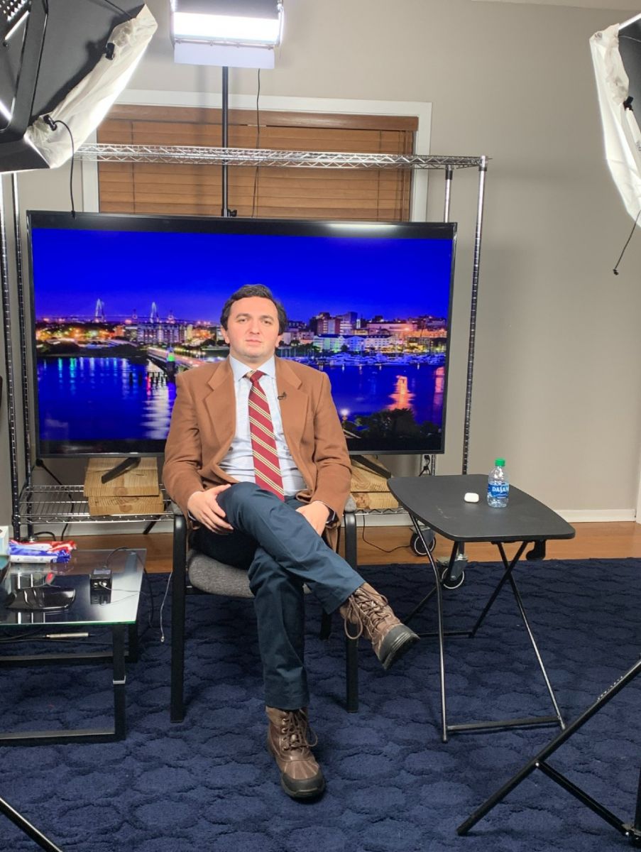 Josh Nass gets ready for an appearance on a national news show from a remote TV broadcast studio in Mount Pleasant. (Photo/Provided by Josh Nass)