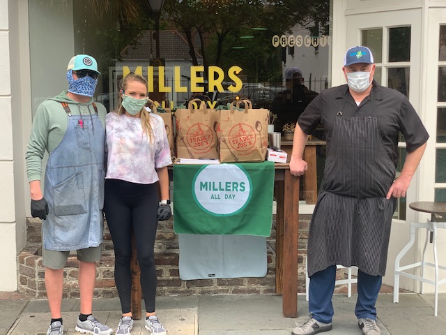 Volunteers from Millers All Day help distribute bags of groceries to food and beverage workers who have been impacted by the pandemic. (Photo/Provided)