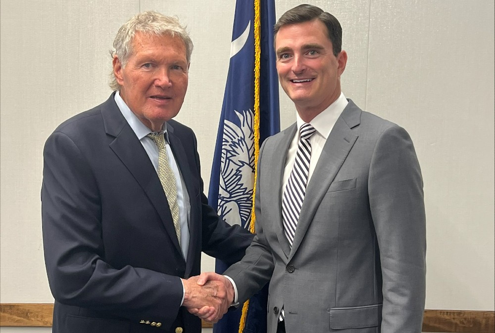 State Sen. Harvey Peeler, left, congratulates Michael Mikota on his appointment to the state Board of Economic Advisers. (Photo/Provided)