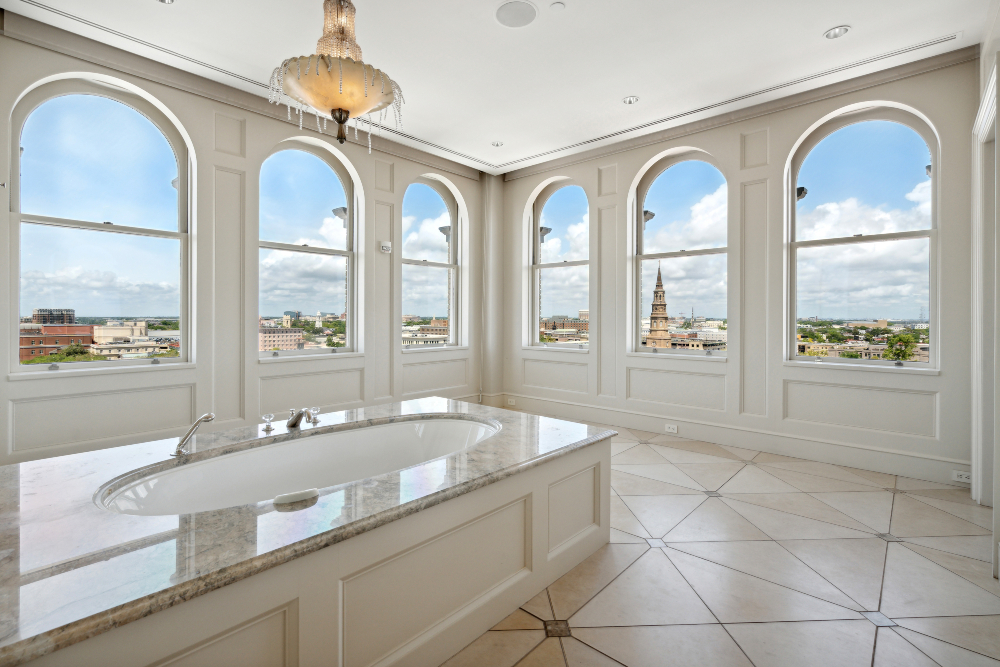 The primary suite is in a separate wing on the eastern side of the penthouse, and is complete with a spa-like marble bath with steam shower, a large dressing room and closet, study with a fireplace, wet bar and even a dog washing room. (Photo/Keen Eye Marketing)