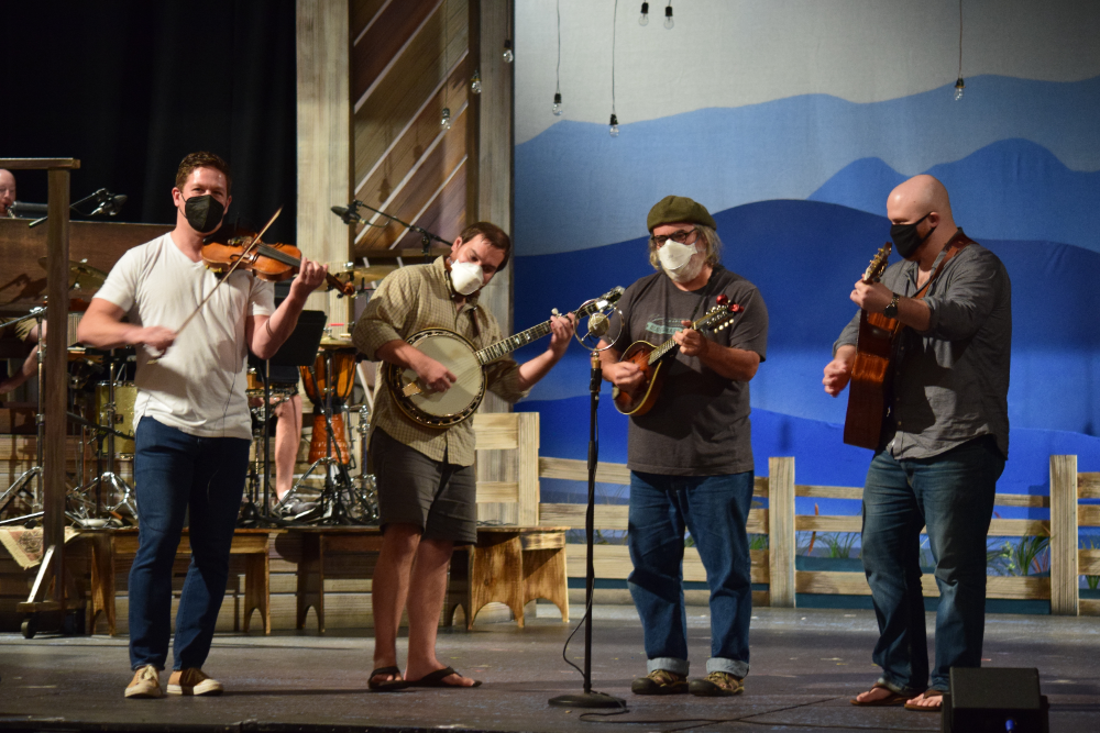 Musicians Christian Zamora, Justin Parrish, John Holenko and Thomas Norris warm up at rehearsals for Charleston Stage's production of "Bright Star." (Photo/Teri Errico Griffis)