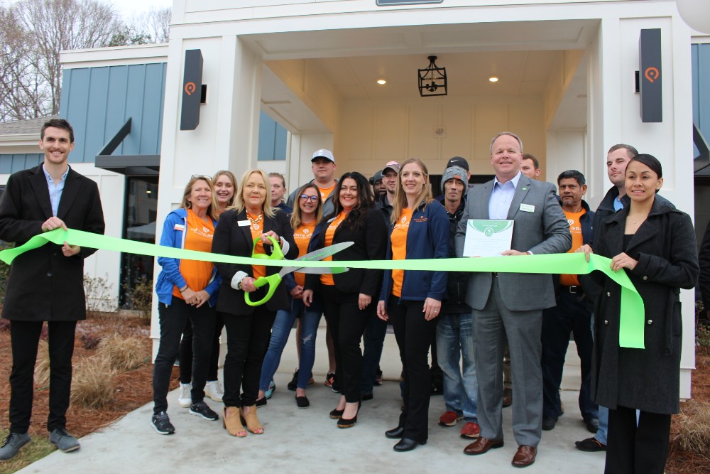 Supporters cut the ribbon on Simpsonville's Pointe Grand Apartment Homes on March 10. (Photo/Provided)