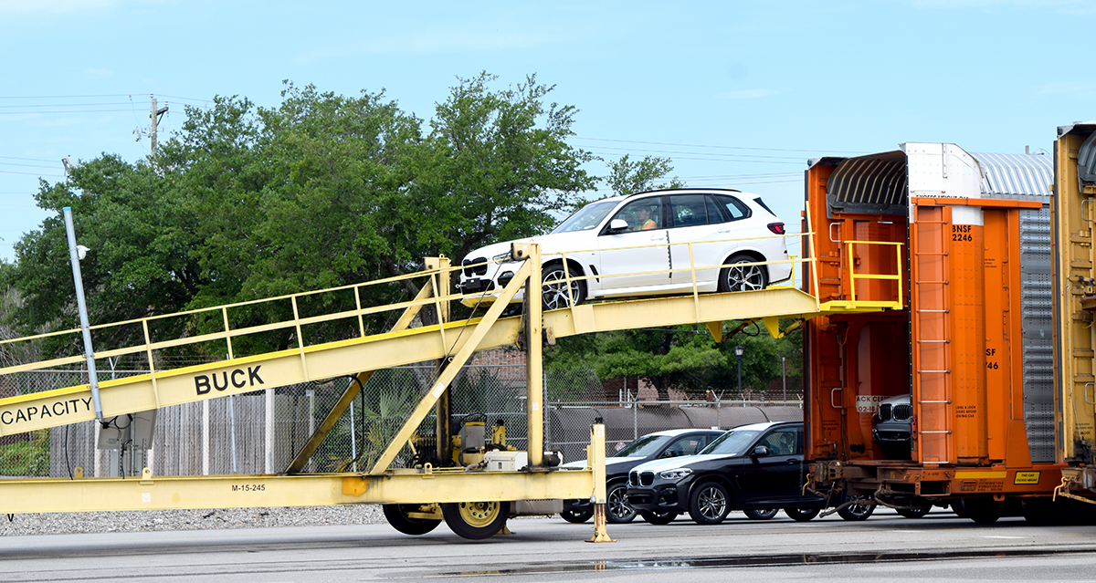 South Carolina-made BMWs roll off of a railcar at the Columbus Street Terminal in Charleston. (Photo/Teri Errico Griffis)