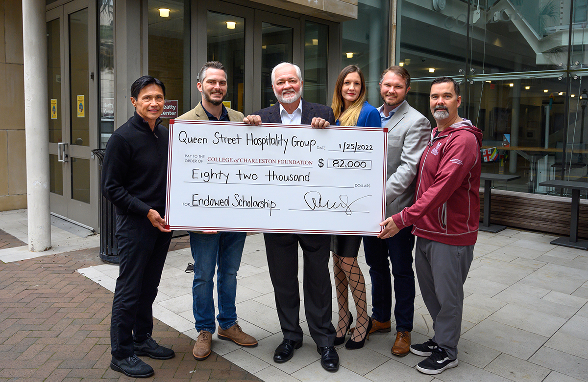 Queen Street Hospitality Group presents a check to College of Charleston, from left, School of Business Dean Alan T. Shao, QSHG Chief Operating Officer Patrick Kish, QSHG Founder Steve Kish, QSHG Event Coordinator Trista Creighton, QSHG Chief Executive Officer Jonathan Kish and Chair, CofC Department of Hospitality & Tourism Management Brumby McLeod.