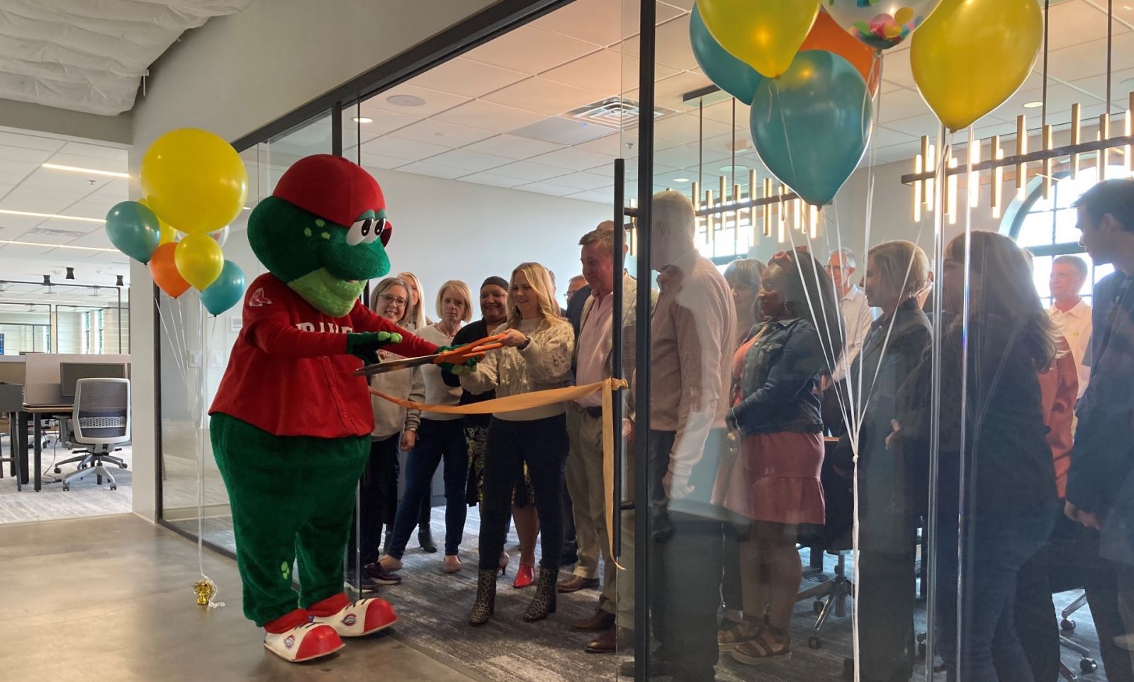 Greenville Drive mascot Reedy Rip'it and owner Craig Brown were present at the ribbon-cutting celebration along with several city officials. (Photo/Provided) 