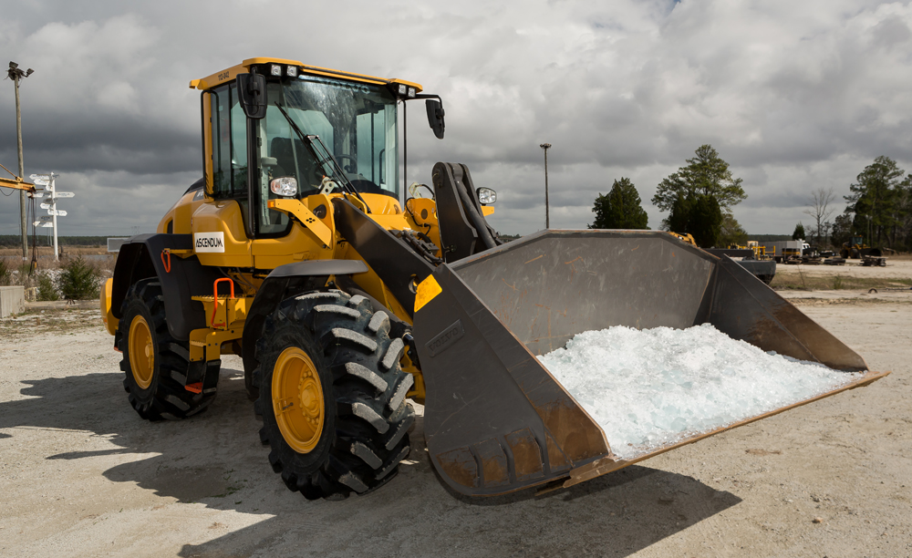 The new facility will dissolve sodium silicate pellets, as shown in the bulldozer pictured, to create liquid sodium silicate. The chemical is used in an array of products, such as detergent, tires and toothpaste. (Photo/Paul Cheney Photography)