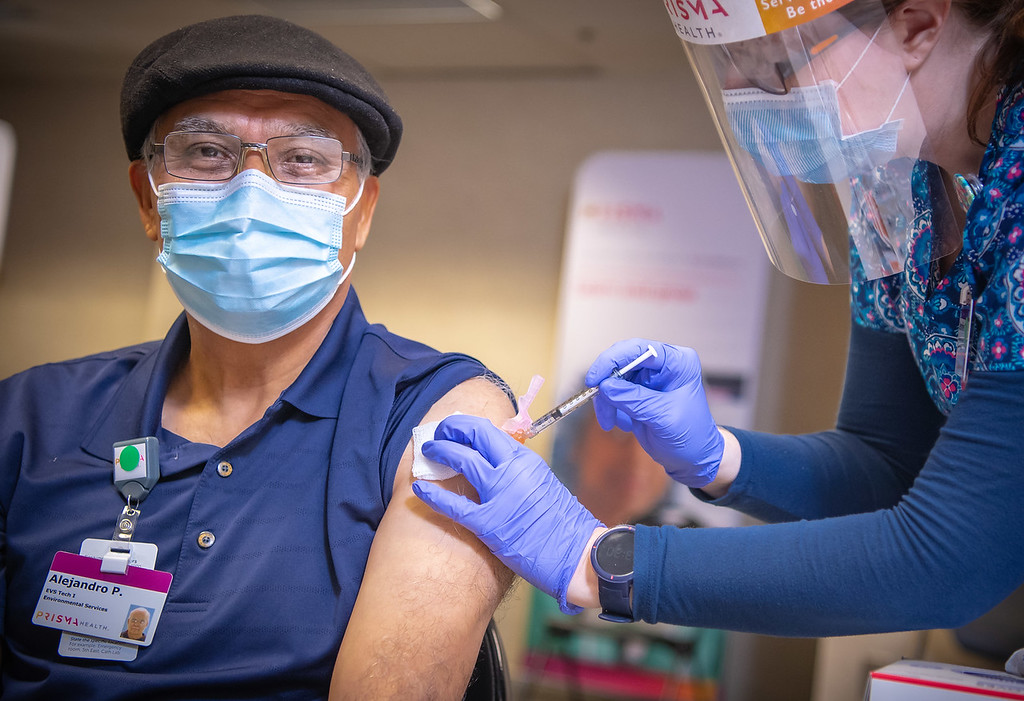 Alejandro, an EVS tech with Prisma, receives a vaccine. (Photo/Provided)