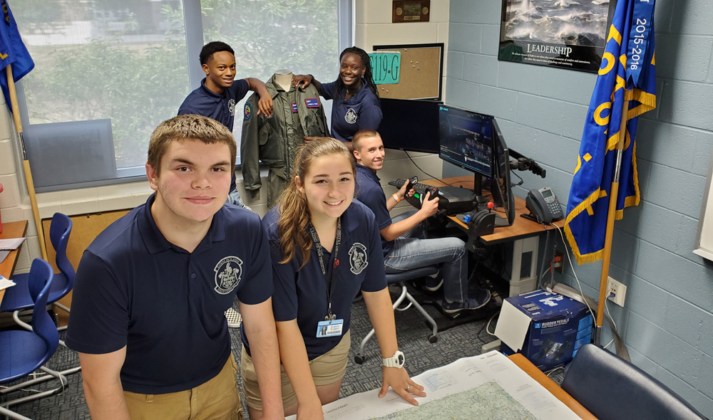 R.B. Stall High School students Andrew Whitney and Kaycee Koontz (front), Keivon Holmes and Antonia Kelly-Caswell (back), and Hunter Kirby have been selected for an Air Force flight training summer program. (Photo/provided)