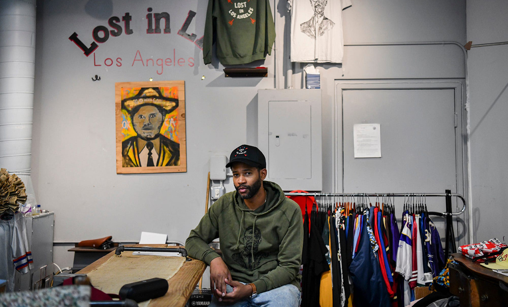 Joel Stallworth poses for a portrait in his store, The Small Shop LA, in Downtown Los Angeles. Stallworth??s store was one of the dozens of stores across Los Angeles that were looted. (Photo/Harrison Hill/USA Today)