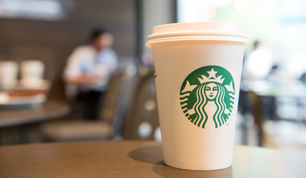 Starbucks said changing consumer behavior from the coronavirus pandemic is driving the move to close 400 stores and expand the company??s pickup model. (Photo/File)