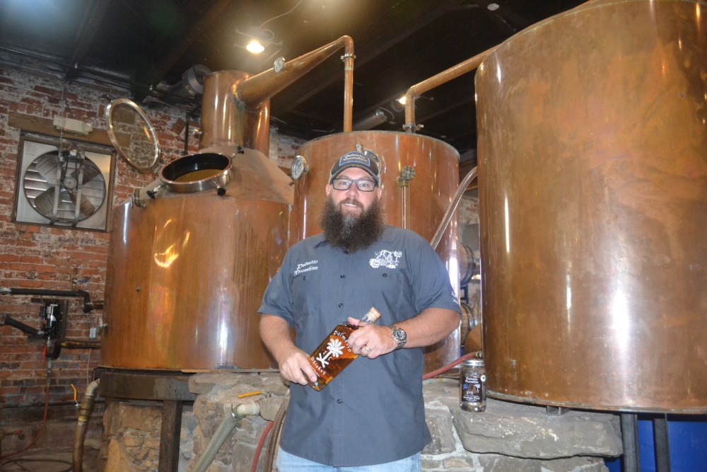 Trey Boggs, of Palmetto Moonshine, said he strives for authenticity in his work. (Photo/Teresa Cutlip)