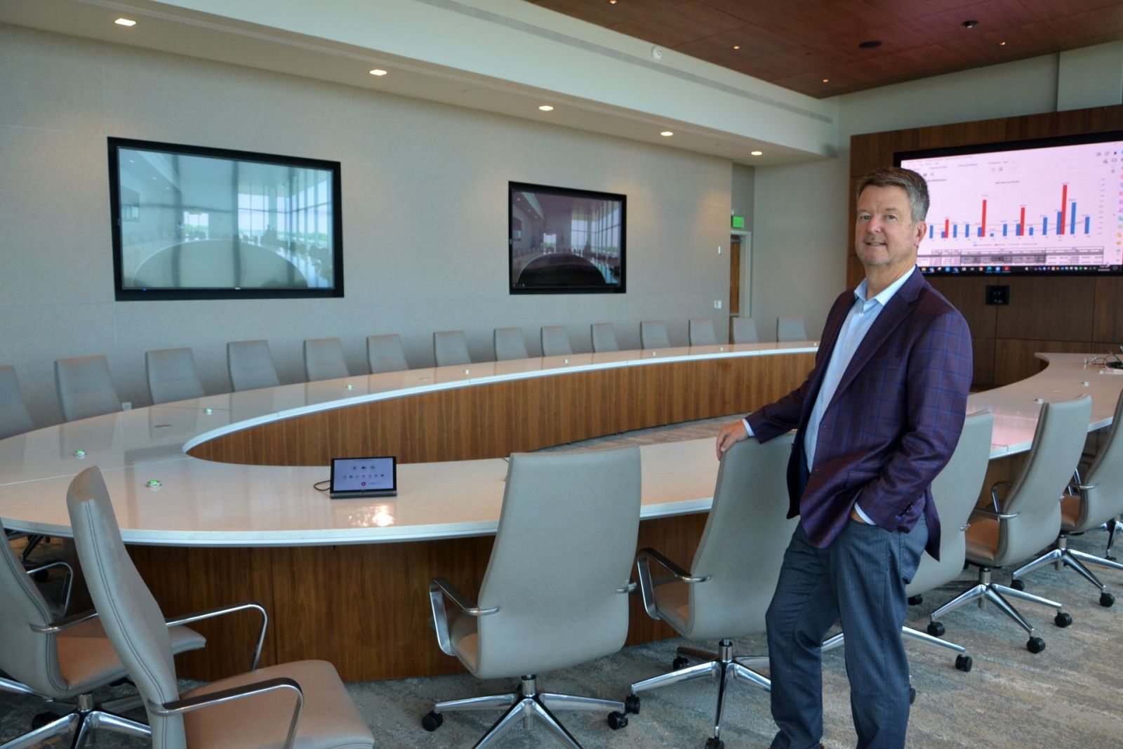 Southern First CEO Art Seaver checks out the bank‰Ûªs new board room, which came together just hours before the first directors‰Ûª meeting in the new building. (Photo/Ross Norton)