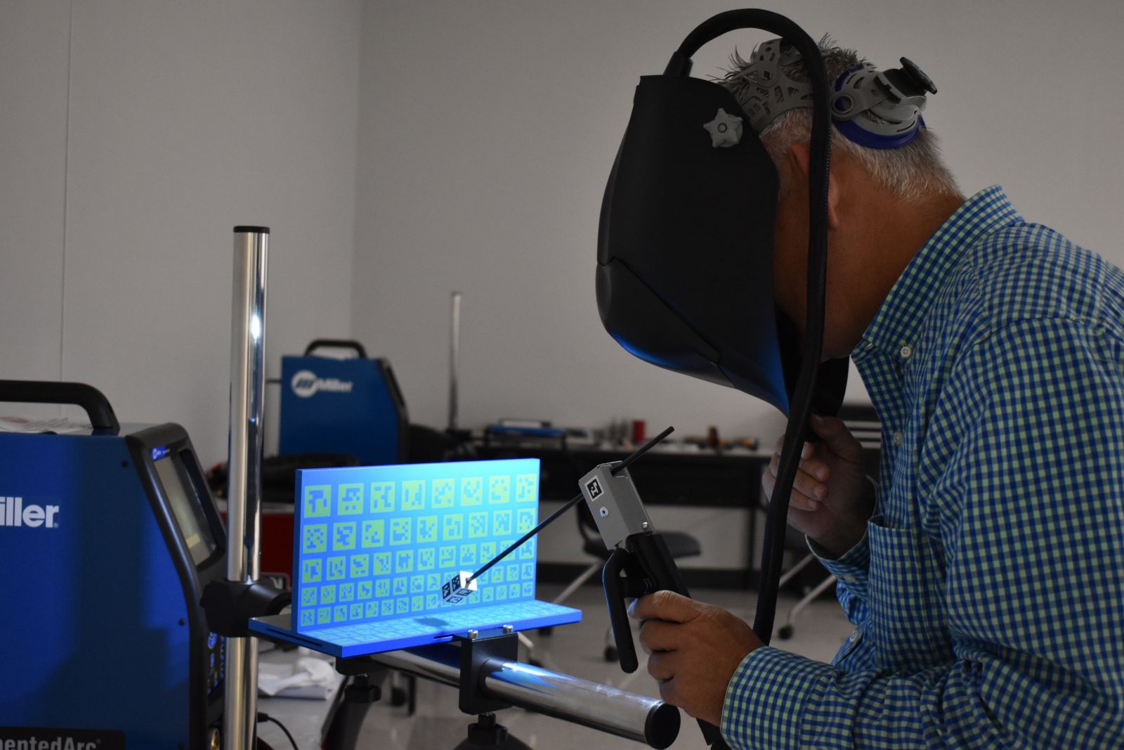 Piedmont Tech's Rusty Denning tries his hand at virtual welding. (Photo/Molly Hulsey)