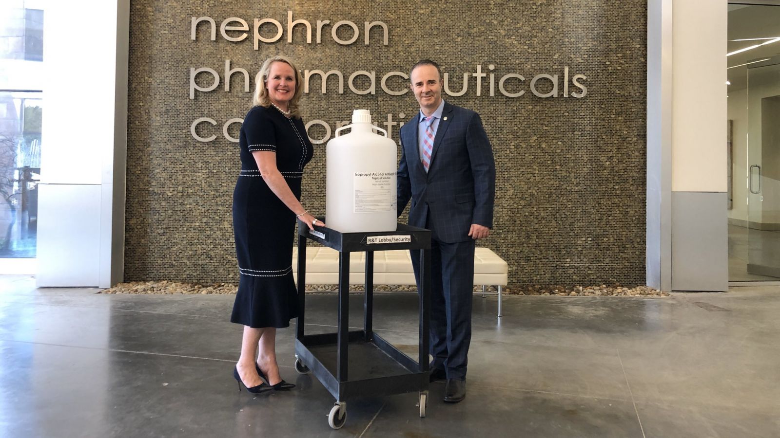 Nephron president and CEO Lou Kennedy (left) donated 50 liters of hand sanitizer made at the West Columbia respiratory medication manufacturer to the William Jennings Bryan Dorn Veterans Affairs Medical Center. (Photo/Provided)