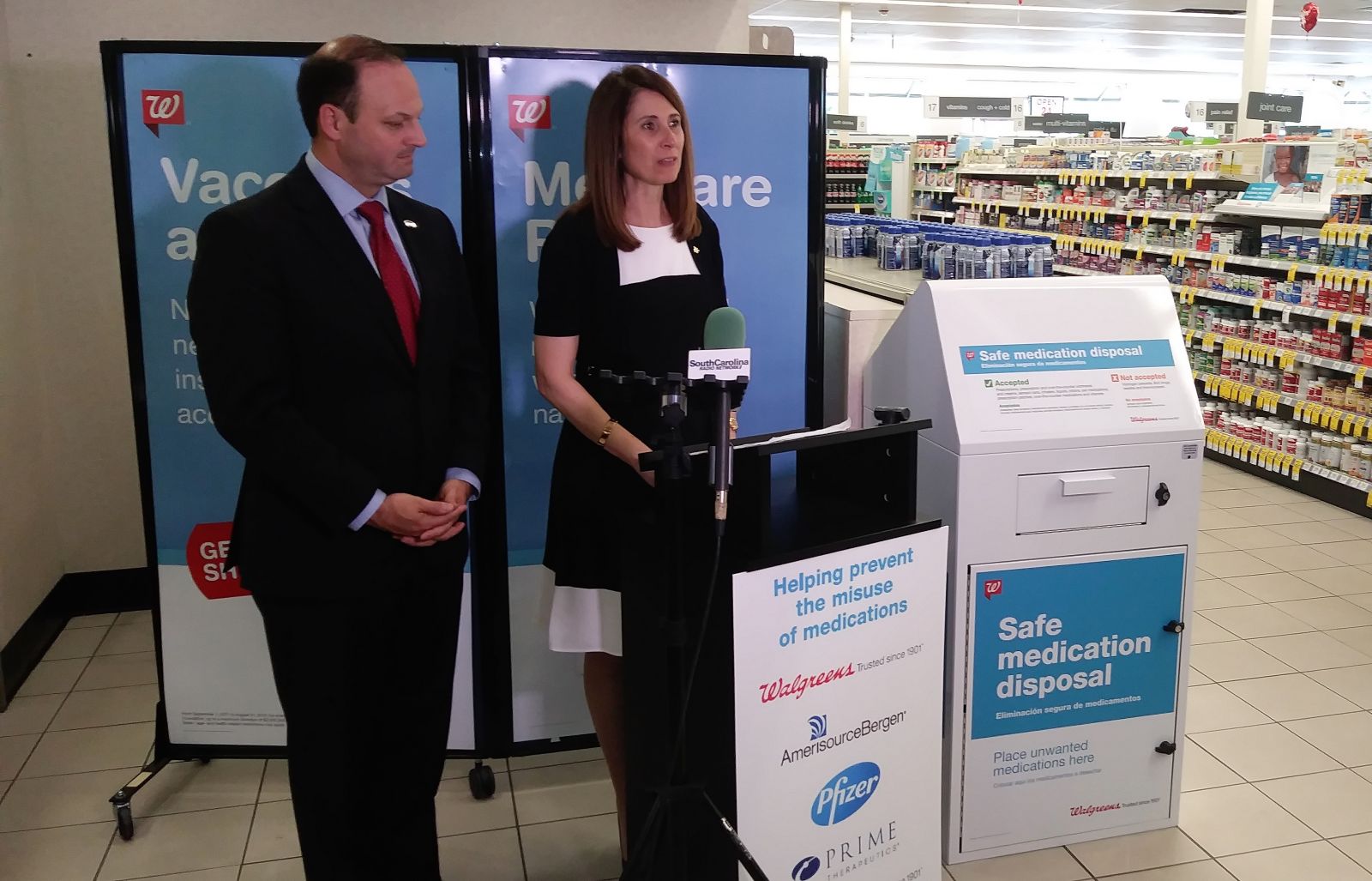 Niki Pappos-Elledge (right), health care supervisor for Columbia Walgreens, announces the addition of 11 medication disposal kiosks around the state. She is joined by S.C. Attorney General Alan Wilson. (Photo/Travis Boland)