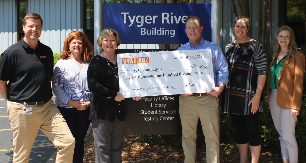 Accepting a check from the Timken Foundation are, from left, Scott Lamitina, HR manager, The Timken Corp., Duncan Distribution Center; Bea Walters Smith, executive director, SCC Foundation and Advancement; Cynthia Gray, health care program director, SCC Corporate and Community Education; Timothy Boosz, warehouse manager, The Timken Corp., Duncan Distribution Center; Melissa Schmitt, director of manufacturing and industrial solutions, SCC Corporate and Community Education; and Caroline Sexton, SCC director of grants.