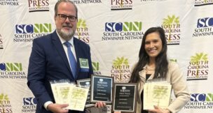 Andrew Sprague, managing editor for production, and Krys Merryman, staff writer, at the conclusion of the South Carolina Press Association's annual awards banquet.